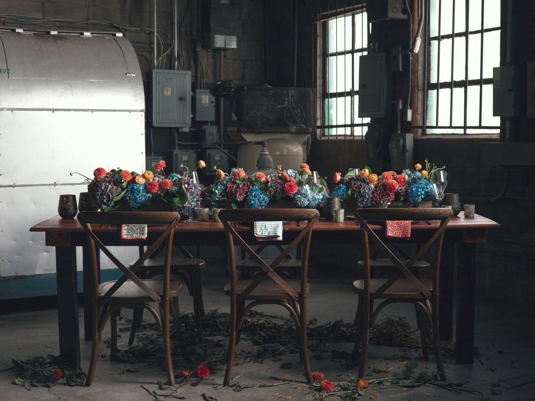 Long dining table set with colorful florals